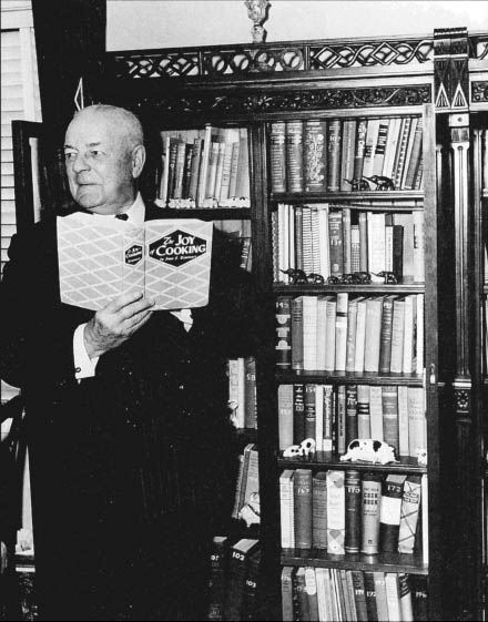 Duncan Hines standing before his huge collection of cookbooks Bowling Green - photo 2