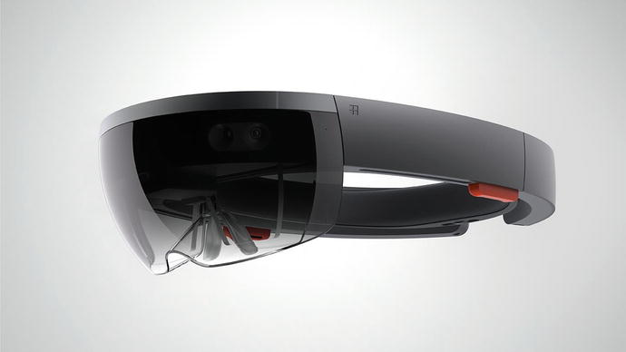 Figure 1-1 Microsoft HoloLens The band does not rest on your ears and at - photo 1