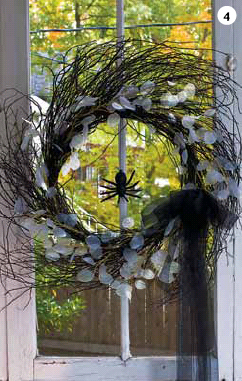 Spray-paint a Twig Wreath black and cover with black glitter then decorate - photo 9