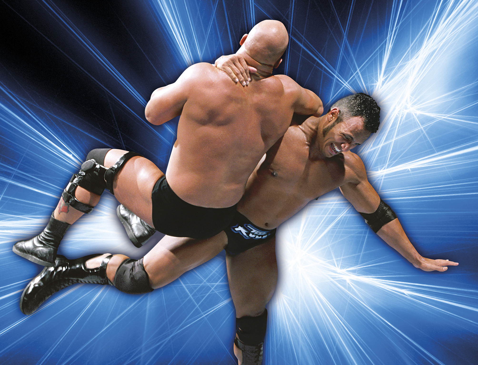 The Rock heaves his biggest foe Stone Cold Steve Austin into a Rock Bottom - photo 4