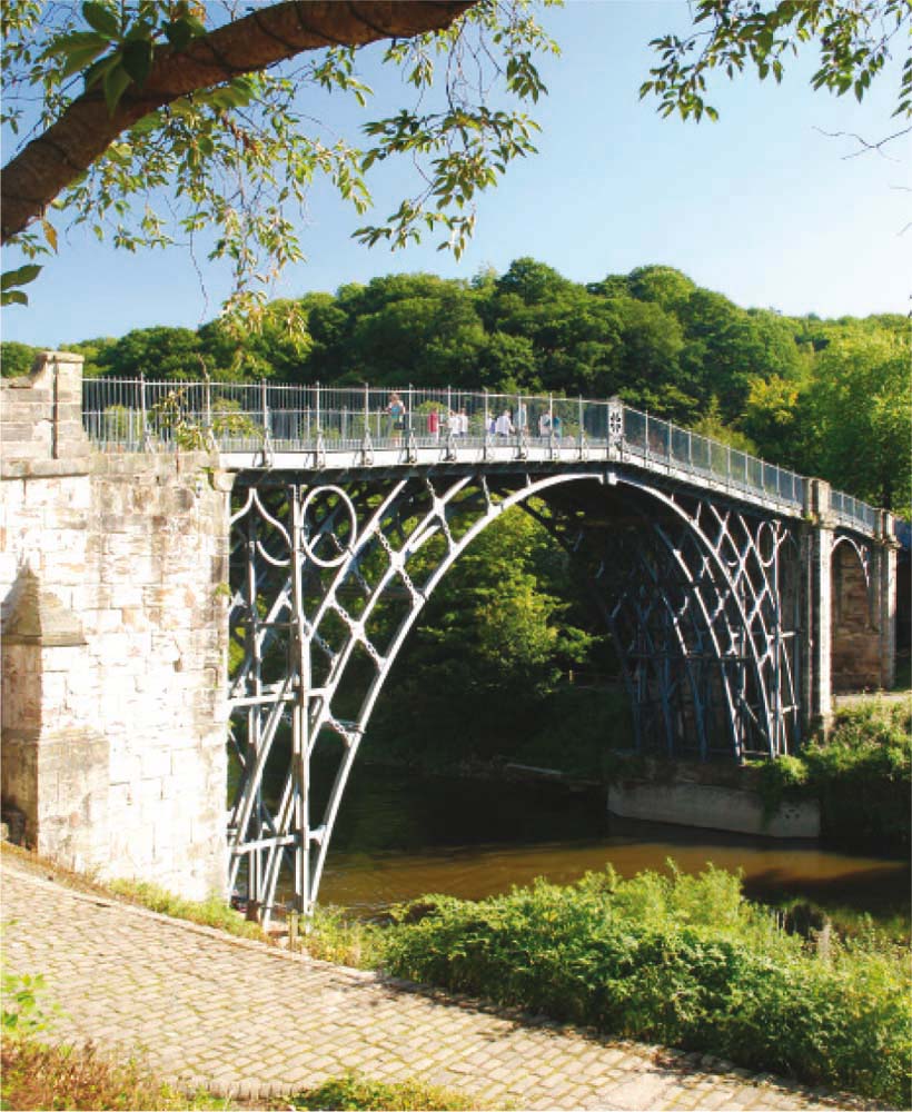 The magnificent arch of the Iron Bridge spanning the River Severn The first - photo 2