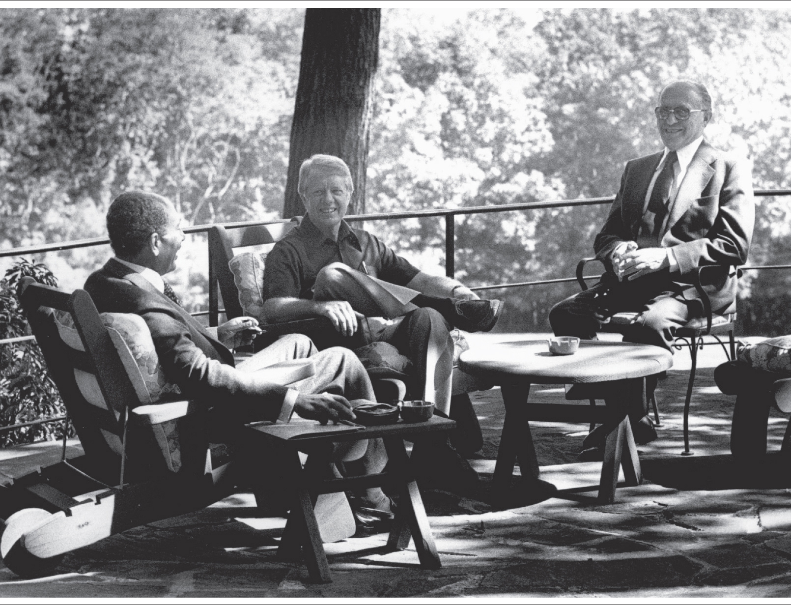 Anwar Sadat Jimmy Carter and Menachem Begin on the porch of the Aspen Lodge - photo 3