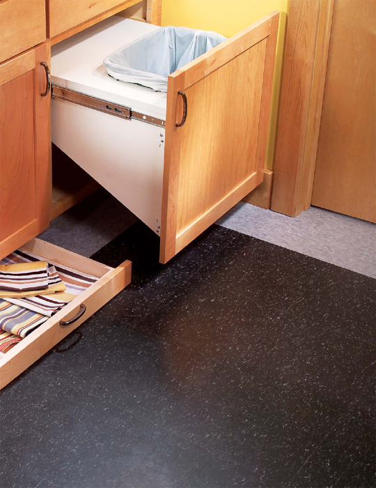 Toe-kick drawer and pull-out trash drawer add convenience to the kitchen by - photo 11