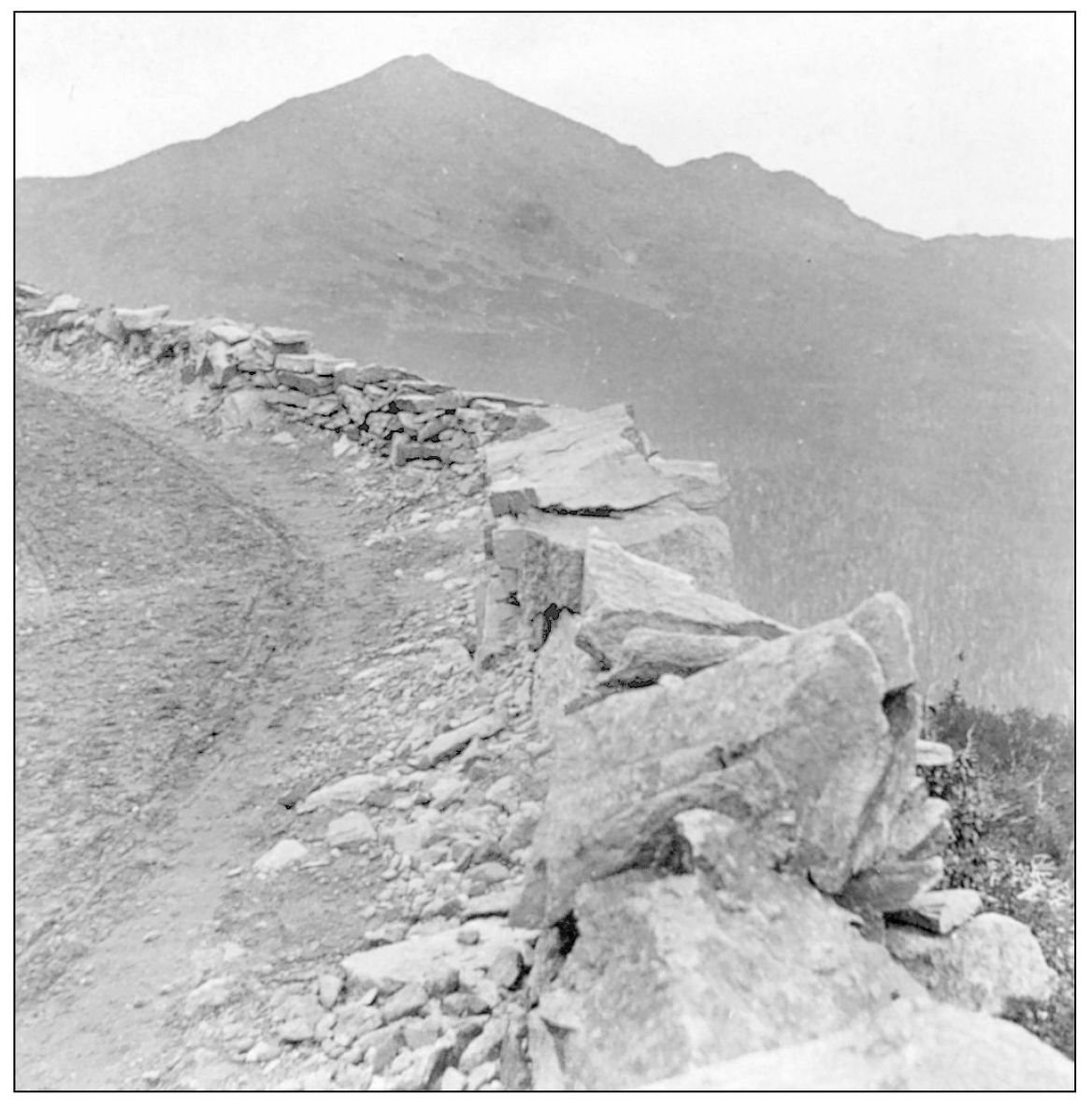 THE LEDGE ON THE MOUNT WASHINGTON CARRIAGE ROAD LOOKING UP THE MOUNTAIN C - photo 9