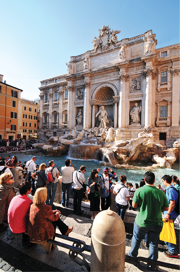 Neptune presides over the baroque Trevi Fountain where tossing in a coin is - photo 12