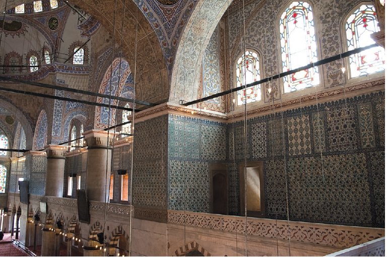 Inside the Sultanahmet Mosque large znik tile panels line the walls along the - photo 9