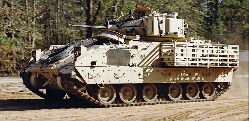 The Bradley M2M3 fighting vehicle was years in development and roundly - photo 3