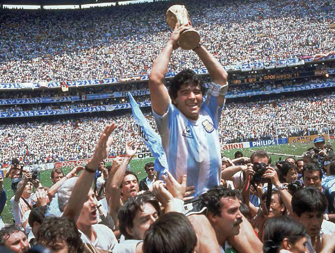 Argentine soccer superstar Diego Maradona is shown here celebrating his - photo 5