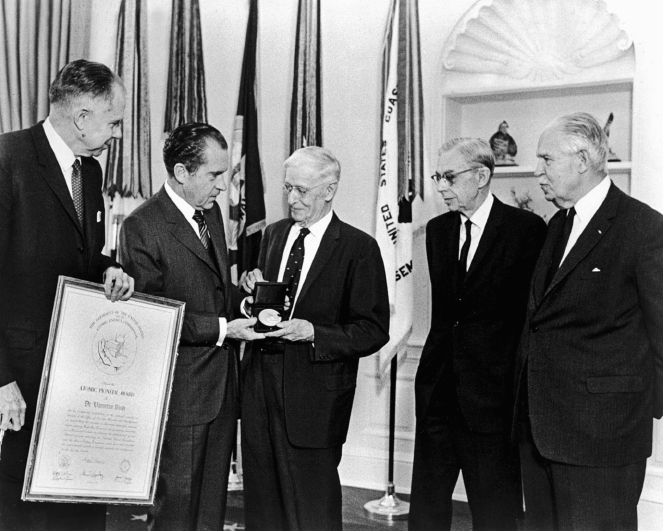 Vannevar Bush age eighty receives the Atomic Pioneer Award from President - photo 5