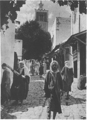 TUNISIAN STREET SCENE French is spoken throughout a large part of the African - photo 2