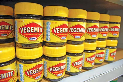 jars of Vegemite in a grocery store Australian banknotes - photo 9