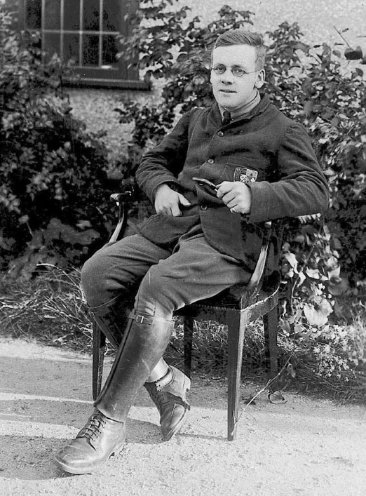 Revd Tubby Clayton founder of TocH outside Talbot House Poperinghe TocH - photo 14