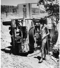 Laraine examines our Land Rover after it rolled on a rough bush track in the - photo 22