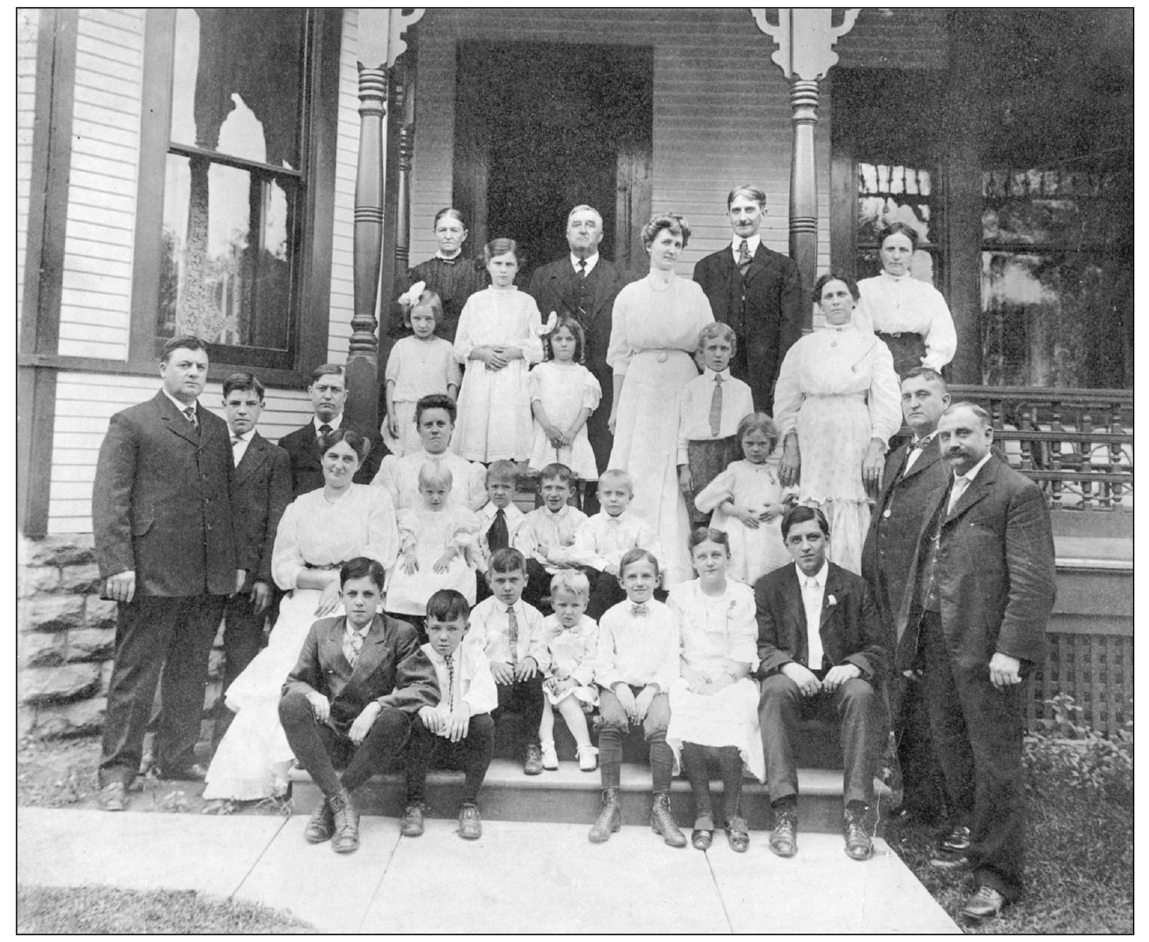 Kruses extended family gathers on his front porch in this c 1910 photograph - photo 5