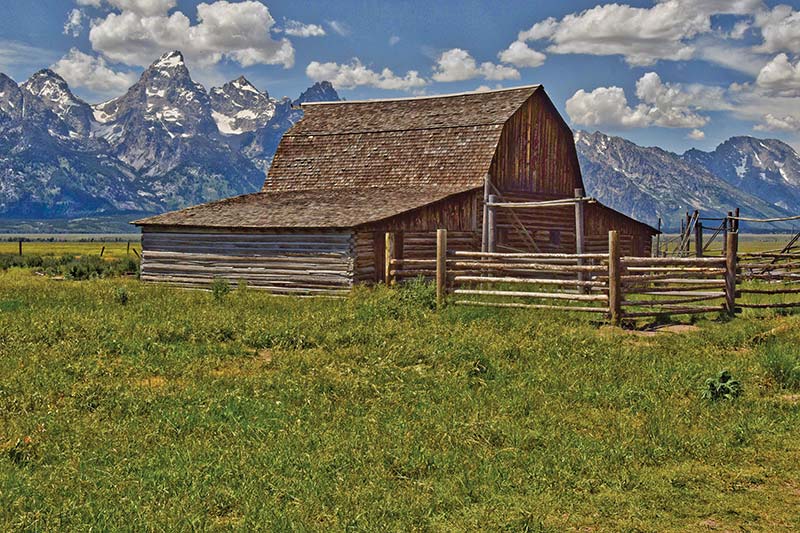 Mormon Row These ranch buildings from the 1890s sit backdropped by the craggy - photo 25