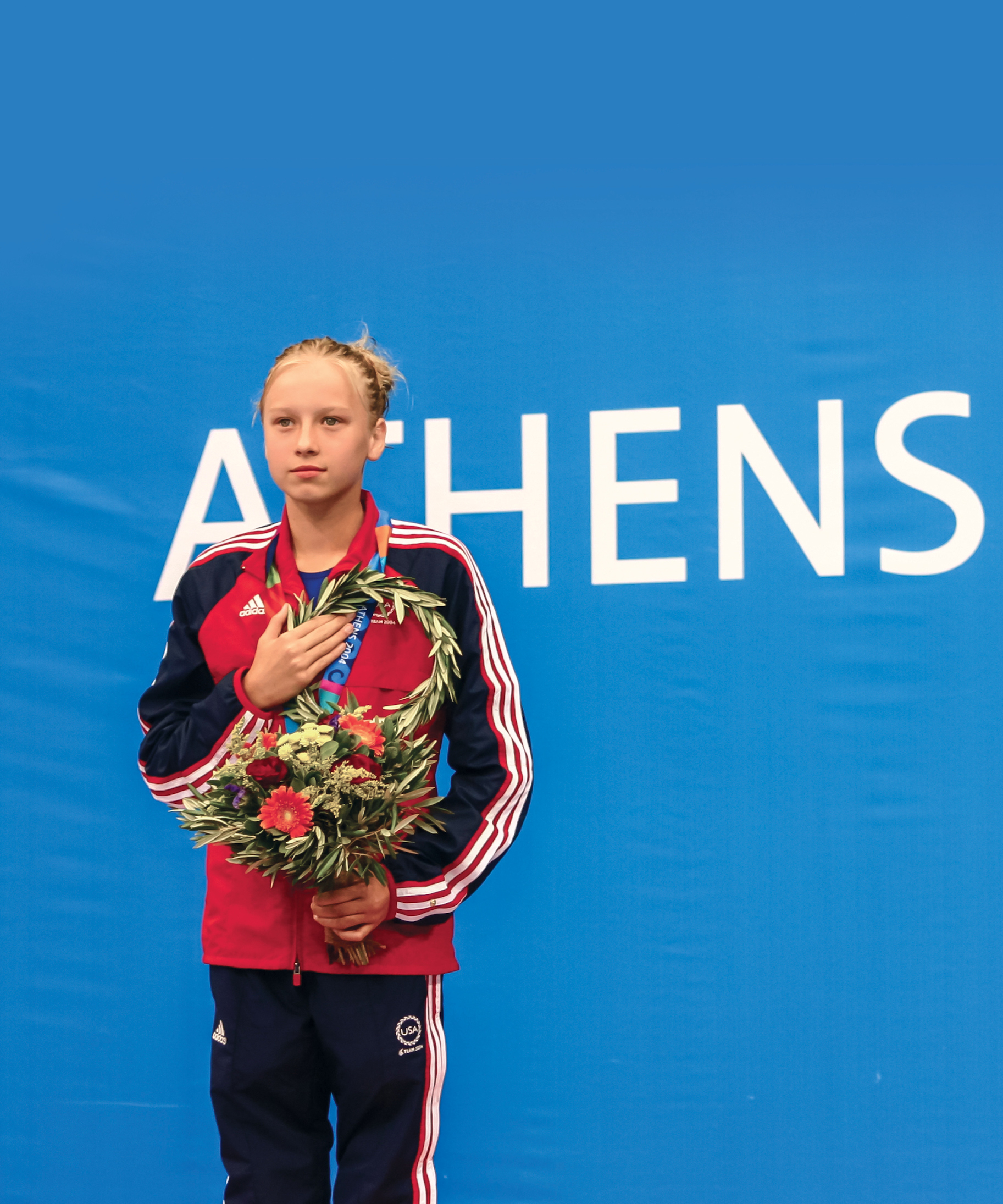 Listening to my national anthem play on the podium at the Athens Games Nothing - photo 4