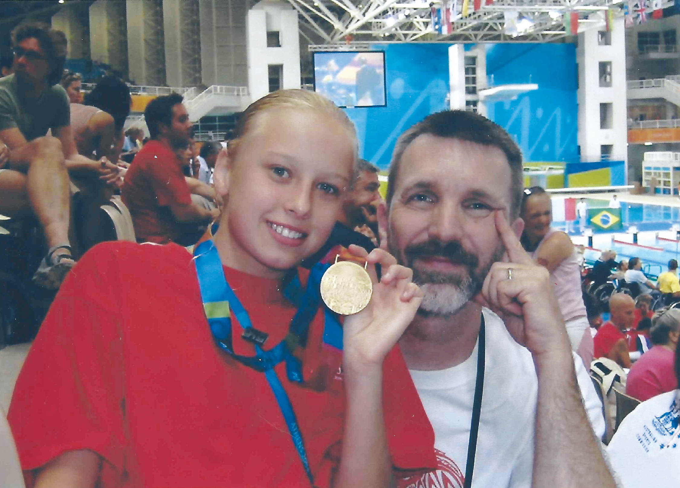 Sitting in the stands with my dad after winning my first Paralympic gold medal - photo 5