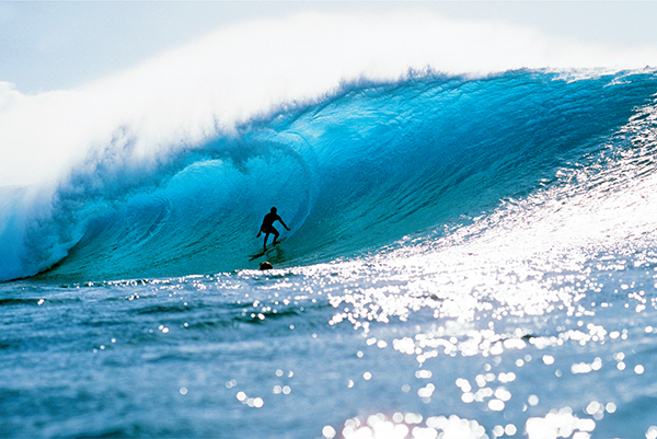 A slight stall at the bottom of a sweet Pipeline wave to let the tube set up - photo 9