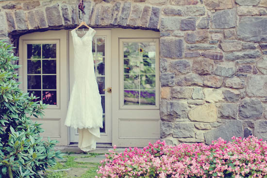 Here is a white lace wedding gown in the still moments before the bride starts - photo 7