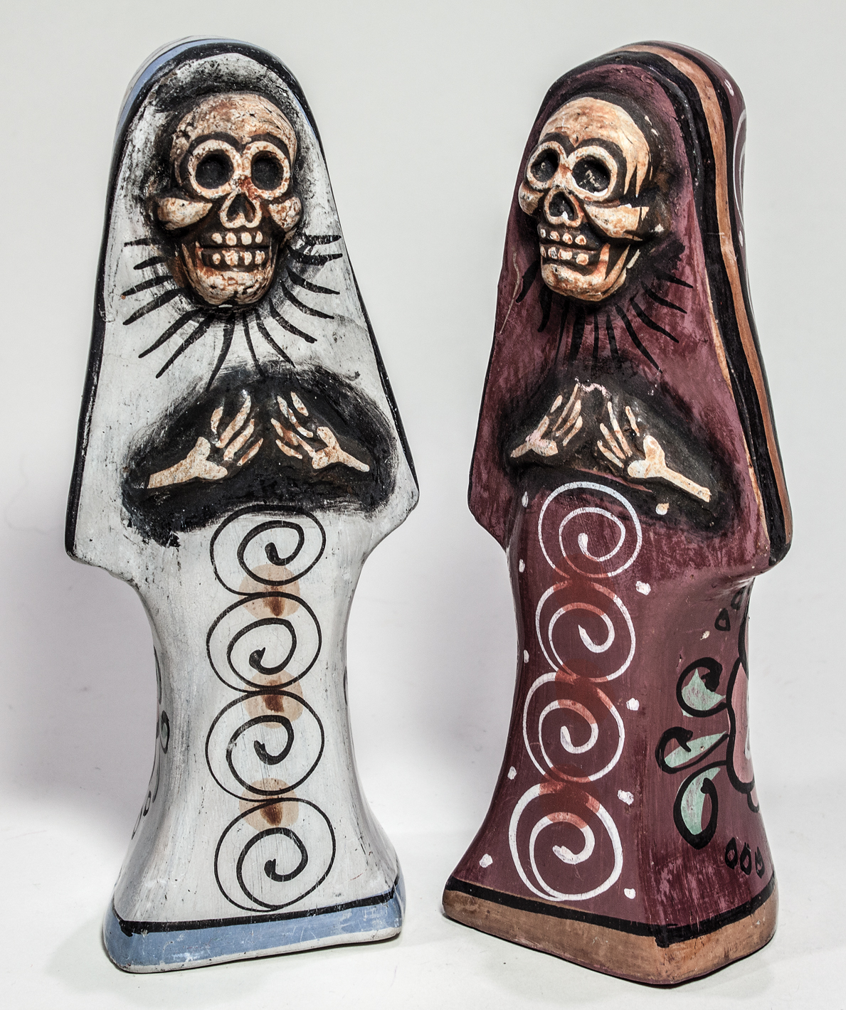 Simple clay forms depict two nuns wearing religious habits The skeletal faces - photo 6