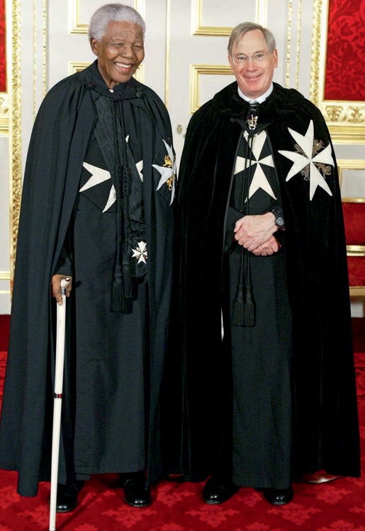 Mandela stands with Britains Prince Richard the Duke of Gloucester at his - photo 4