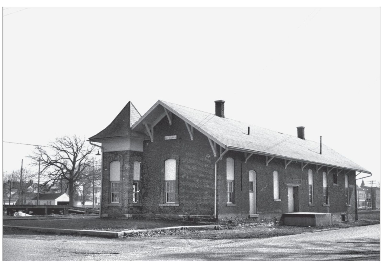 This depot replaced an earlier passenger depot located at the crossing of the - photo 5