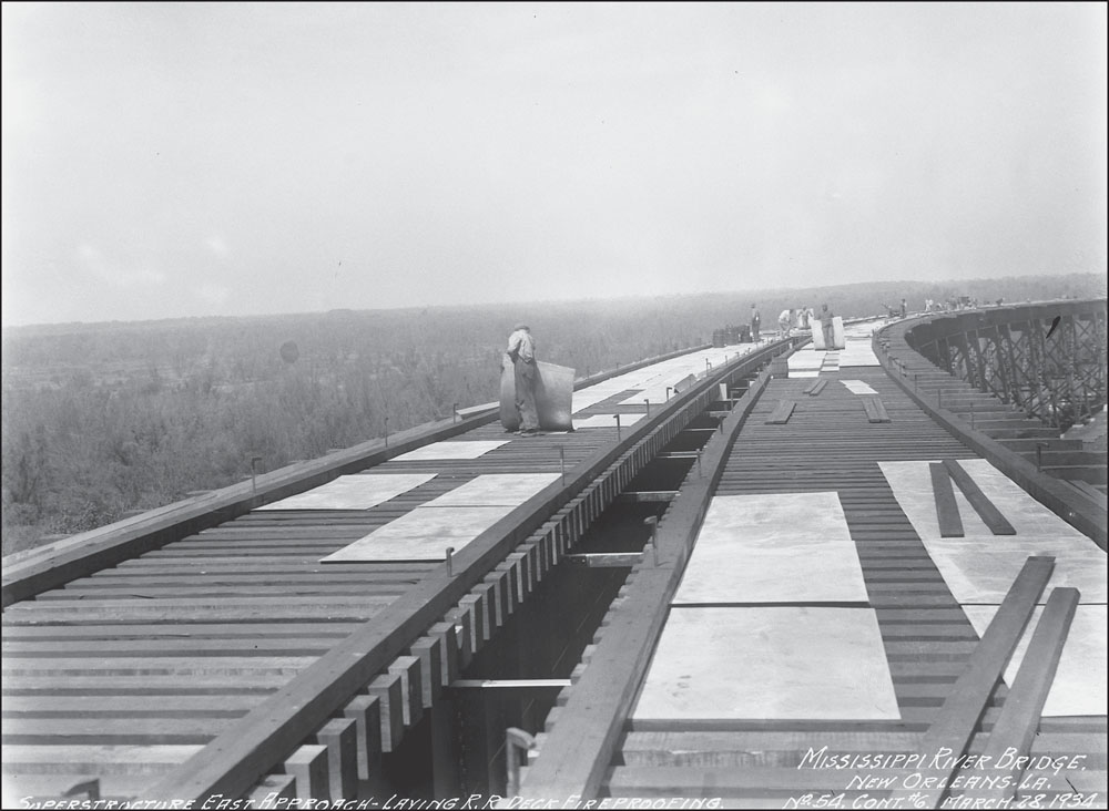 Ol Man River Bows to Engineers Skill Beneath Mighty Bridge at New Orleans is - photo 2