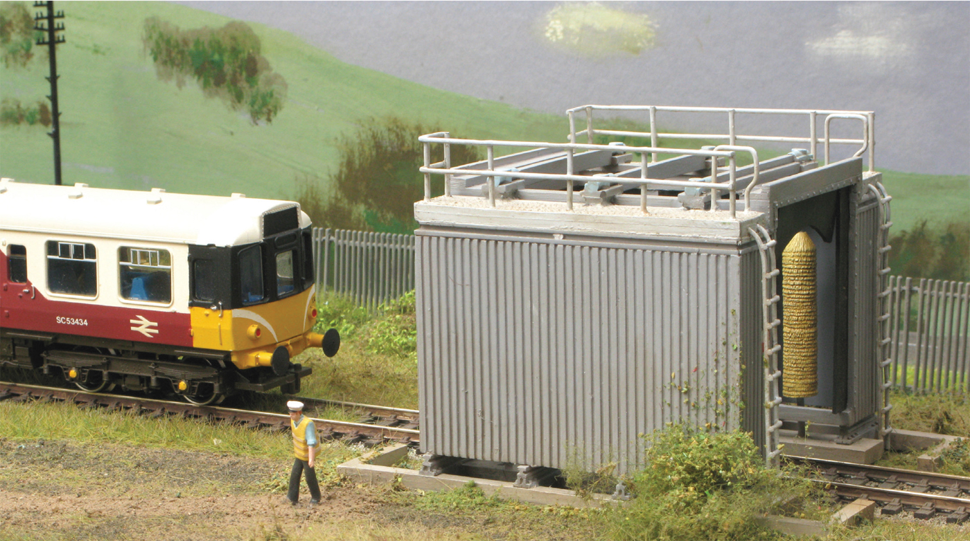 The DMU washing plant by Scenecraft with a modified Hornby Class 110 DMU - photo 2