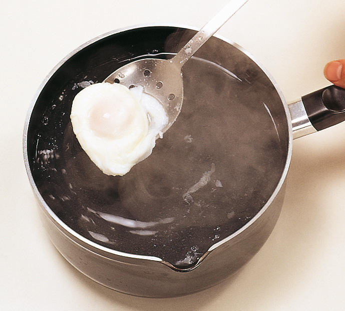 Lift out the egg with a slotted spoon and drain briefly on paper towels To - photo 13