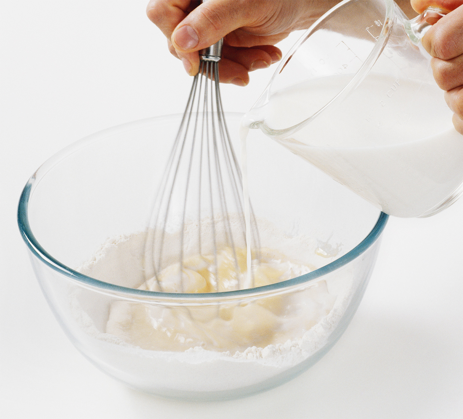 Gradually whisk in half of the remaining milk drawing in the rest of the flour - photo 15