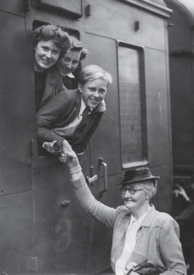 Guernsey evacuees John Helyer Hazel Hall and June le Page leaving Bury - photo 4