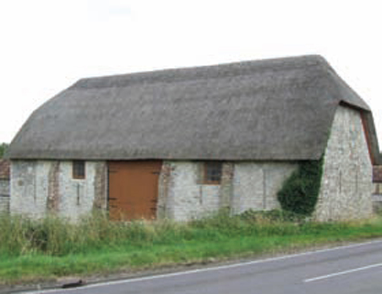 More commonly thatched gables have a half-hipped rounded ridge end as on this - photo 4