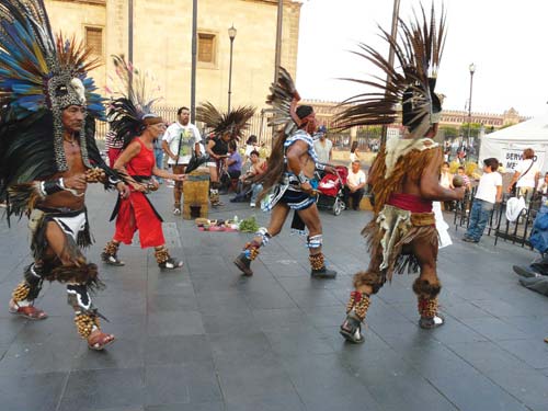 Traditional dancers in the Zcalo Sculptures at the Templo Mayor - photo 4