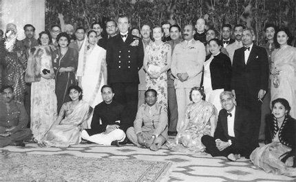 My grandfather BR Talwar seated in bow tie and dinner jacket with Lord and - photo 6