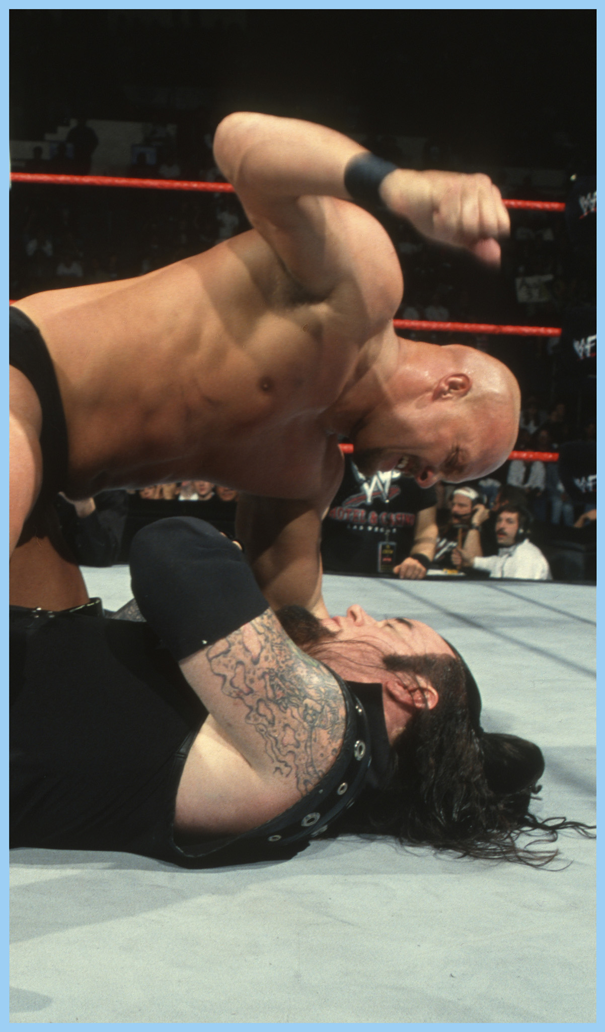 April 27 Stone Cold Steve Austin pounds Undertaker before claiming victory in - photo 7