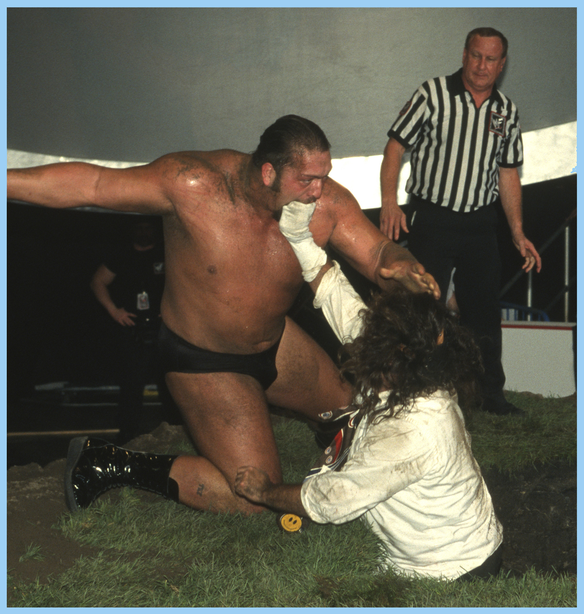 September 9 Mankind tries to hold off Big Show with his sock puppet Mr Socko - photo 9