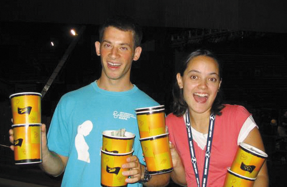 Joel and Jena holding popcorn buckets of cash at Six Flags Jars of Clay - photo 8