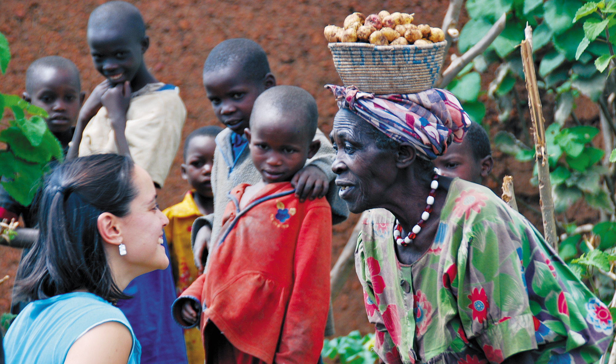 Jena and a community member in Rwanda Jumping rope with school children - photo 11