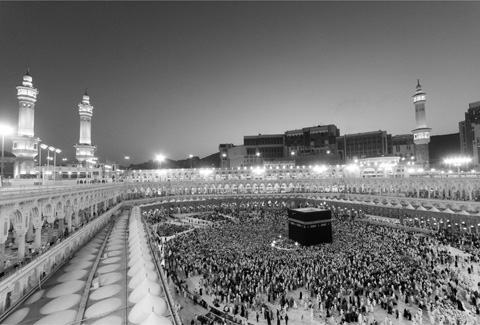 1 Muslim pilgrims circumambulate tawaf the sacred Kaaba during sunrise - photo 3