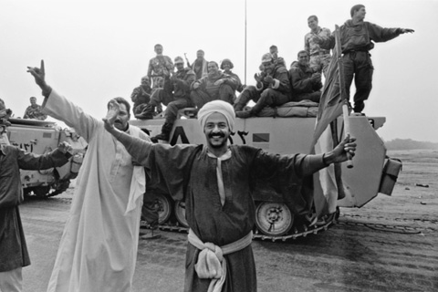 9 Kuwaiti men dance in the streets and Egyptian coalition forces join in as - photo 11