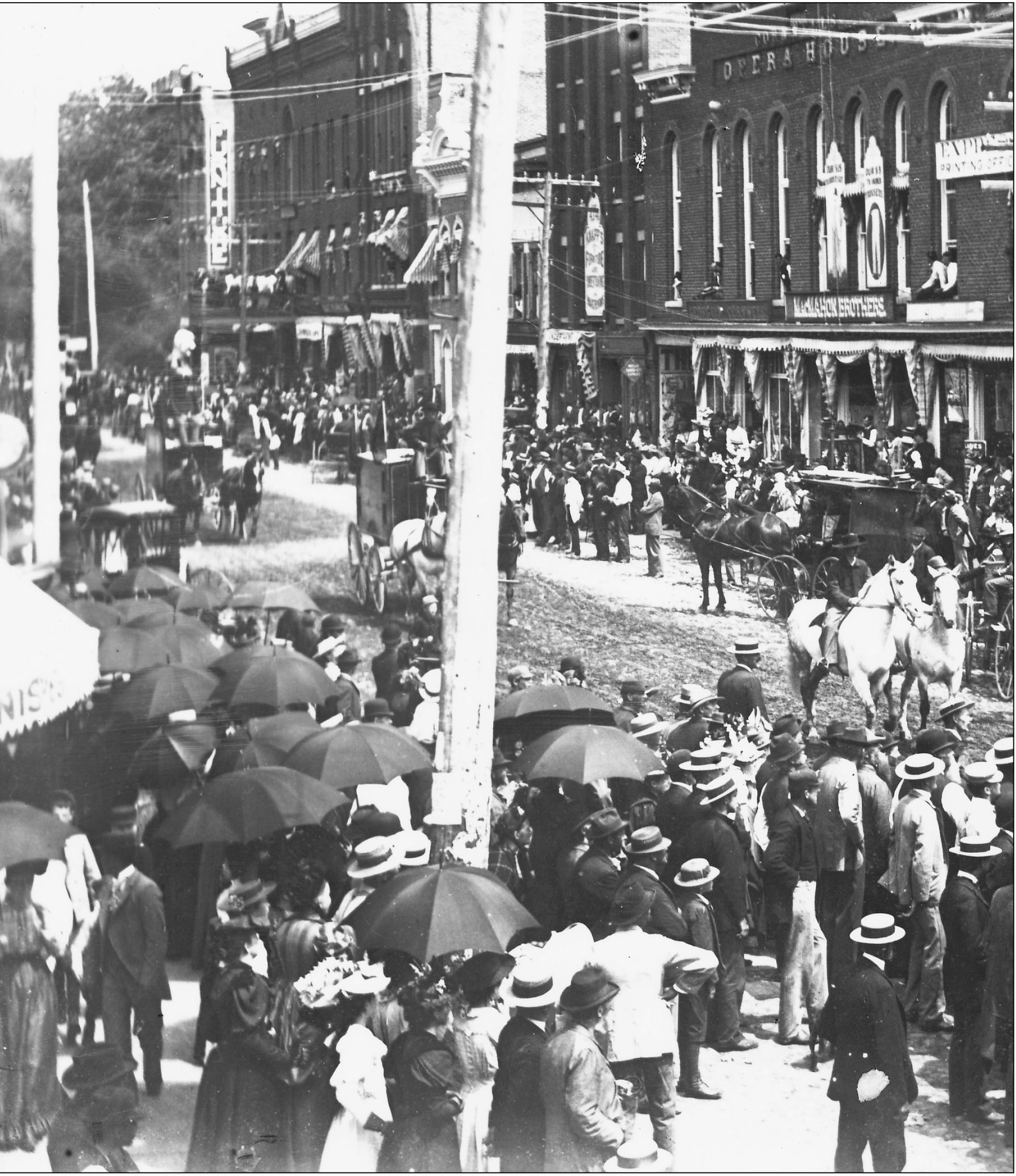 A circus parade on Main Street in the 1890s moves from the train to the - photo 8