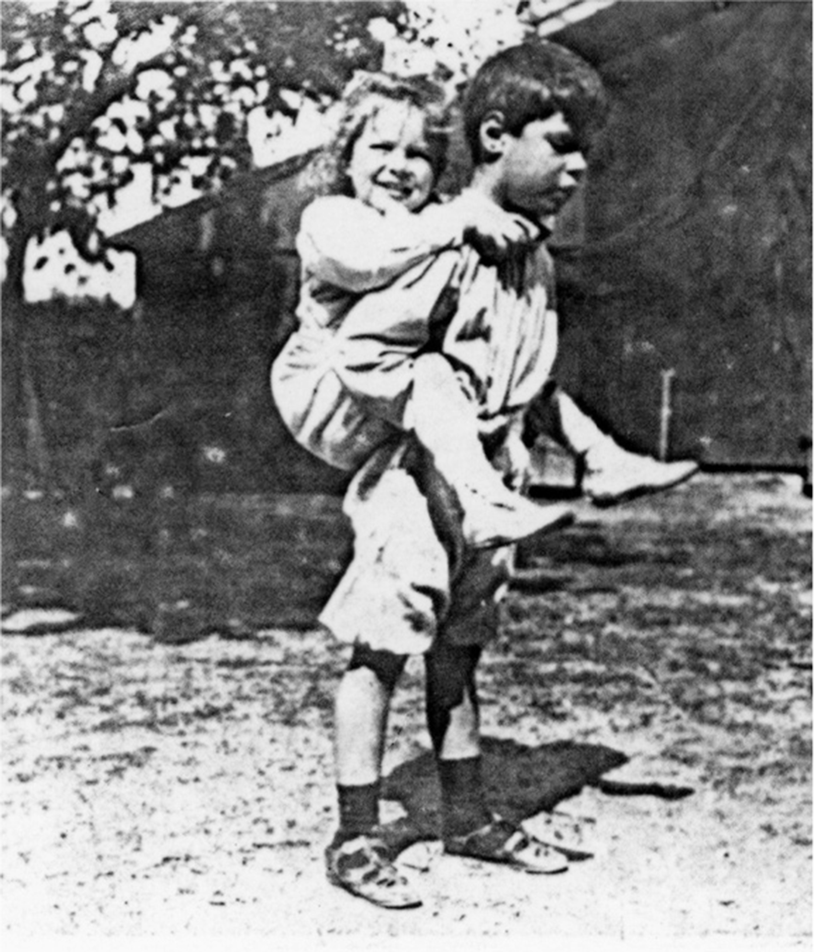 Young Virginia riding piggyback on John Virginia and John left and middle - photo 14