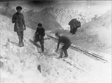 Convicts clear the rail tracks after a snowstorm On the left with a spade in - photo 13