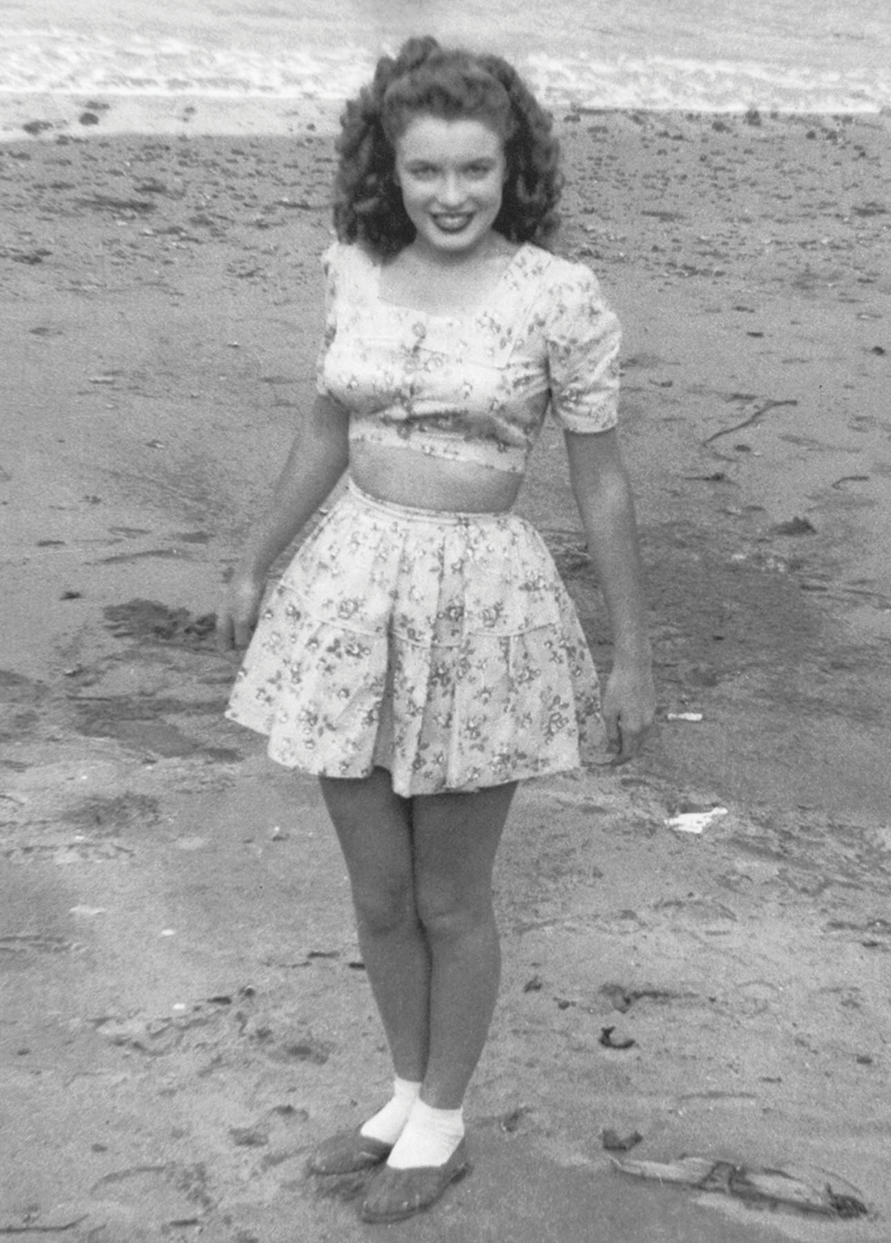 Norma Jeane poses on a beach at Catalina Island Her modeling career was just - photo 8