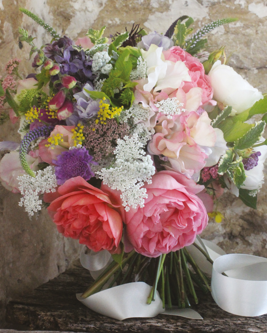 A brides hand-tied bouquet with garden roses for an early-summer wedding - photo 6