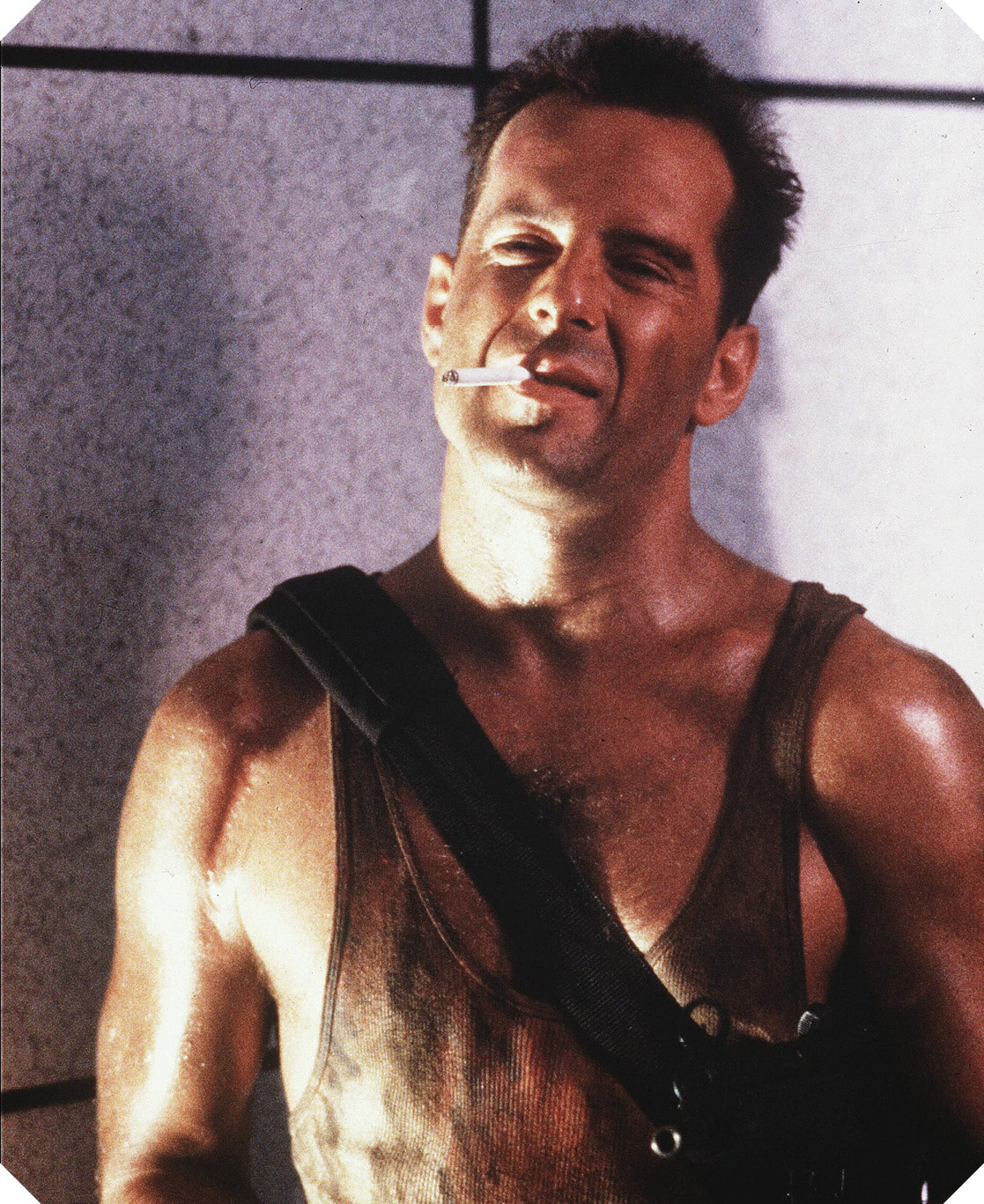 In a decade overflowing with tank topwearing action heroes Bruce Williss John - photo 4