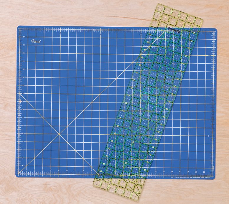 To use the rotary cutter you will also need a ruler and cutting mat A long - photo 11