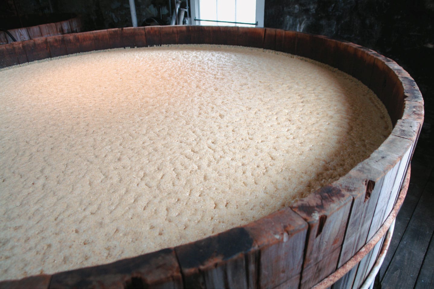Detail of the fermenting process of making bourbon Woodford Reserve - photo 9