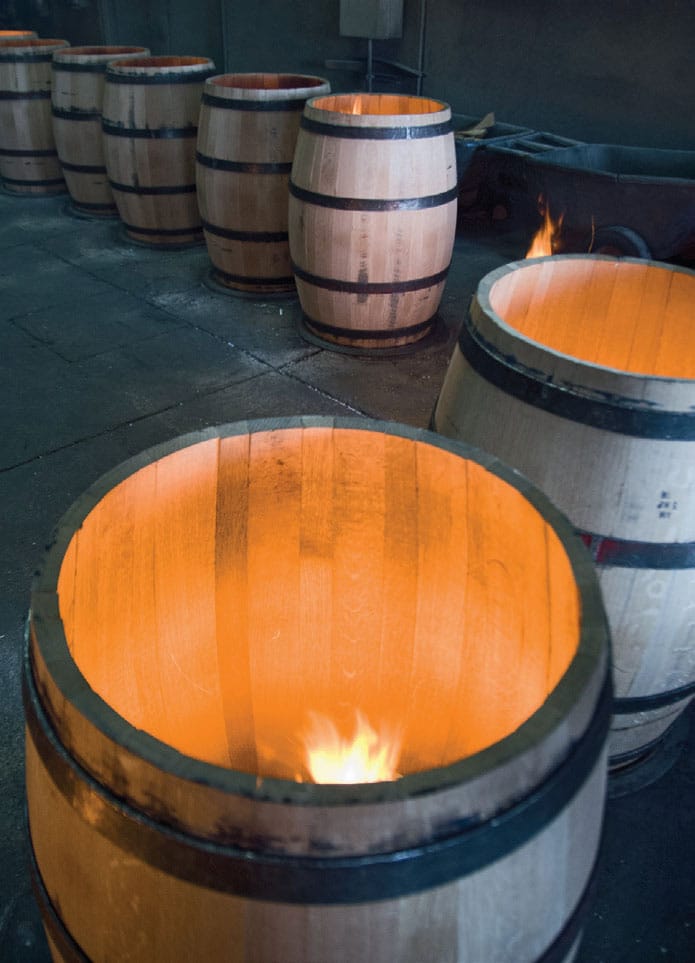 Charring oak barrels at Bluegrass Cooperage Where did the craft-distilling - photo 10