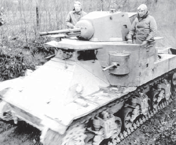 A photograph of an early variation of the M2 tank which was the direct - photo 3